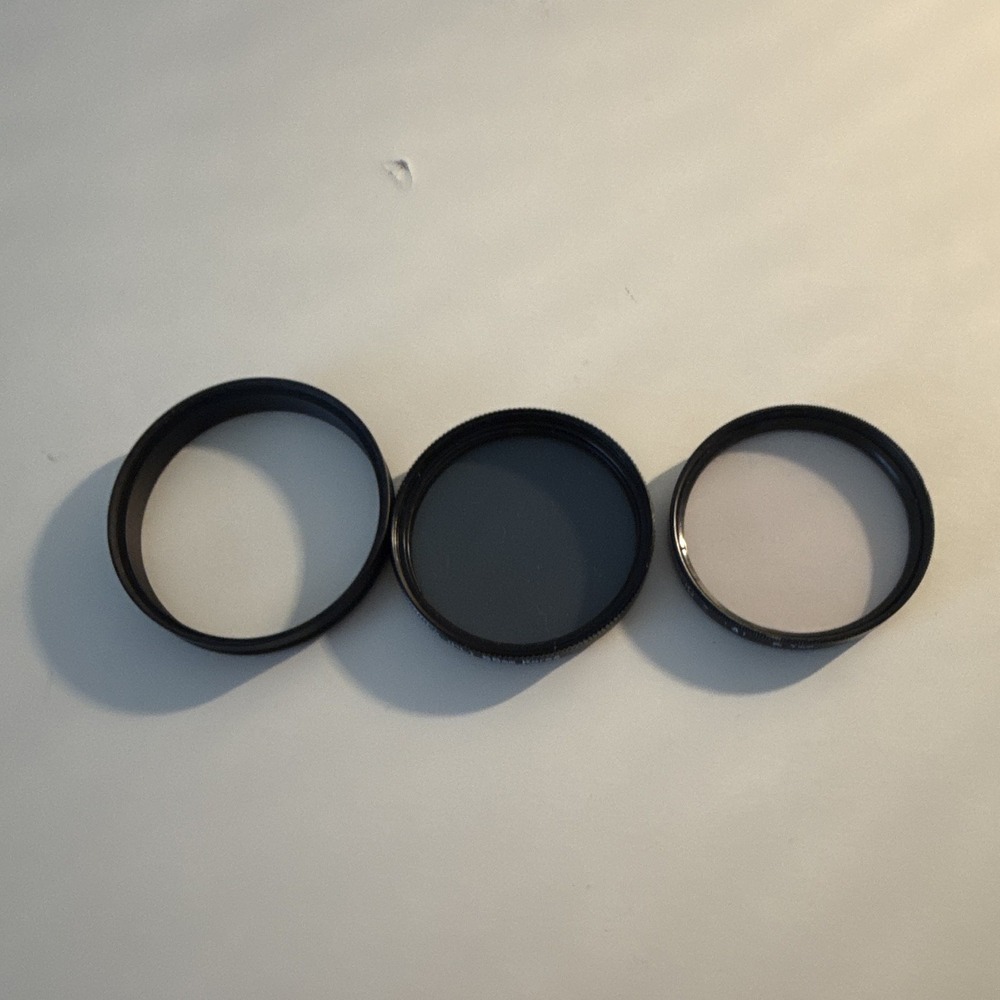 3 camera items mixed sizes and effects (2lens filters and 1 step up unknown make